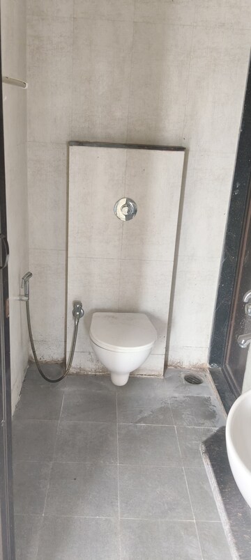 Bathroom in 1 BHK Apartment at Puranik Hometown, Ghodbunder Road – for Rent