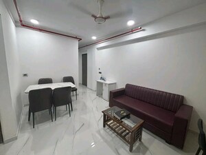 Living Room in 2 BHK Apartment at Nahars Optionz Shopping Plaza CHS, Chandivali – for Sale