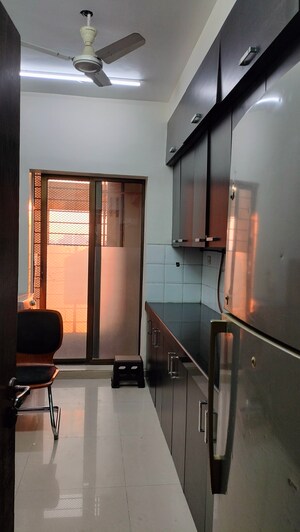 Kitchen in 5 BHK Apartment at Oberoi Realty Woods, Goregaon East – for Rent