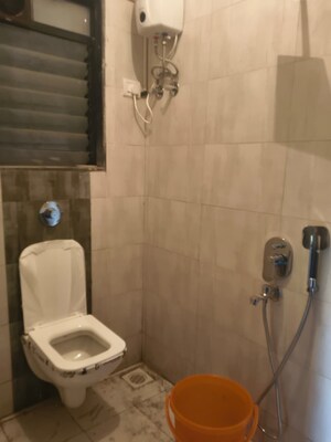 Bathroom in 2 BHK Apartment at Chandak Unicorn, Andheri West – for Rent