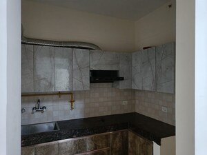 Kitchen in 3 BHK Apartment at Amrapali Golf Homes, Sector 4 Greater Noida – for Sale