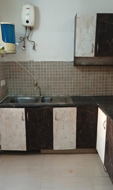 Kitchen in 3 BHK Apartment at Amrapali Zodiac, Sector 120 – for Rent