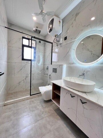 Bathroom in 4 BHK Builder Floor at Ansal API Esencia, Sector 67 – for Sale