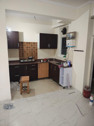 Kitchen in 3 BHK Apartment at Amrapali Zodiac, Sector 120 – for Rent