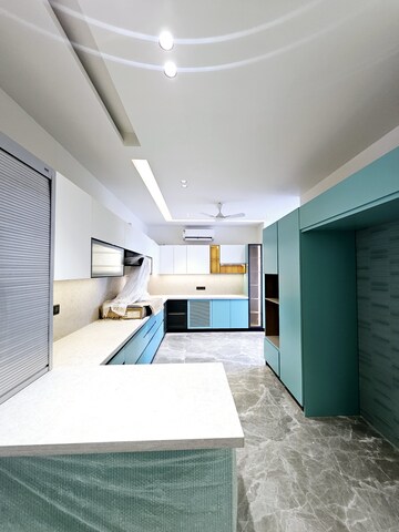 Kitchen in 4 BHK Builder Floor at Sushant Lok I – for Sale