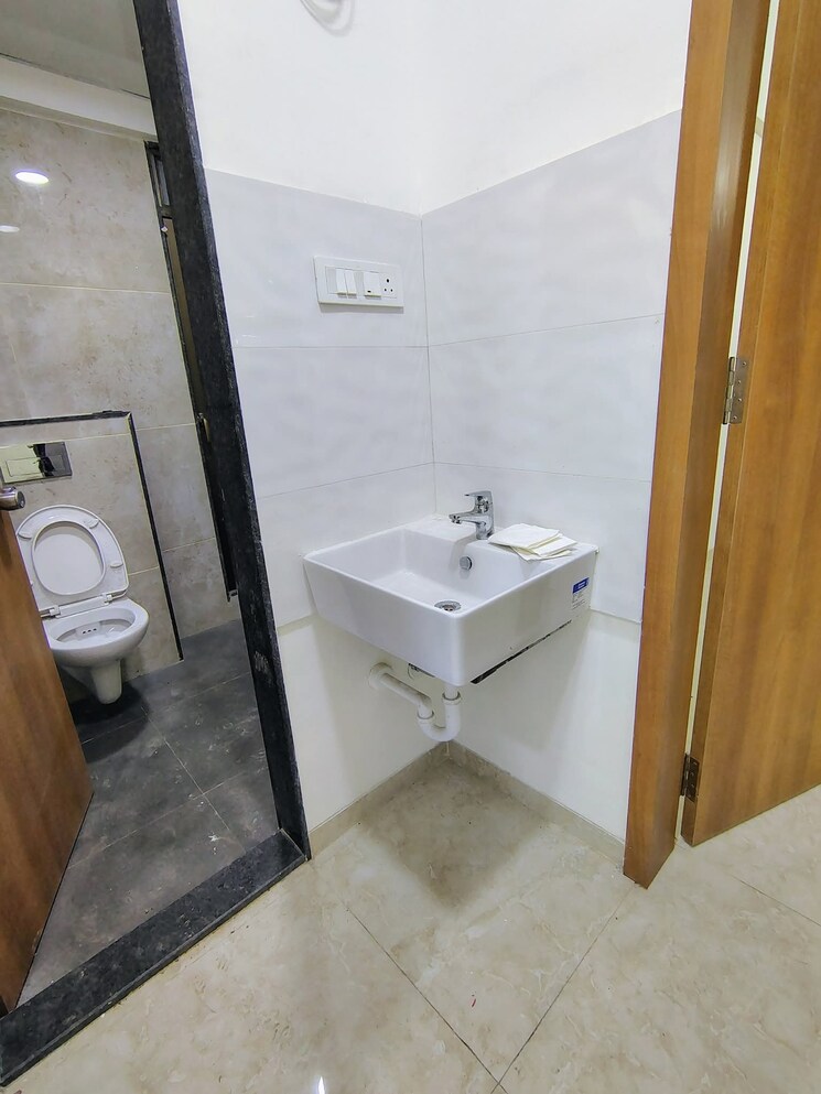 Bathroom, gaikwad-nirvanas 3 Bedroom 1077 Sq.Ft. Apartment In Wakad Pune 9562872