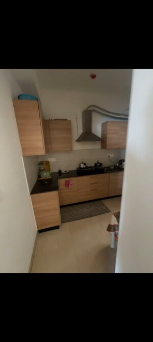 Kitchen in 3 BHK Apartment at ATS Happy Trails, Sector 10 Greater Noida – for Rent