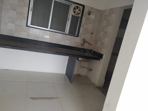 Kitchen in 2 BHK Apartment at Axis Paradigm Whistling Meadows, Paud Road – for Rent