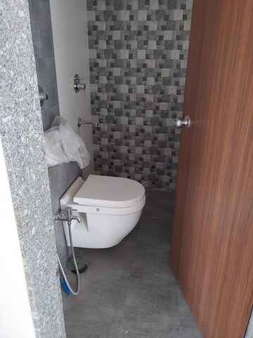 Bathroom in 2 BHK Apartment at Axis Paradigm Whistling Meadows, Paud Road – for Rent