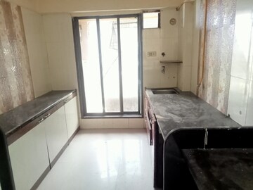 Kitchen in 2 BHK Apartment at Pratik Shree Sharnam CHS, Mira Road East – for Rent