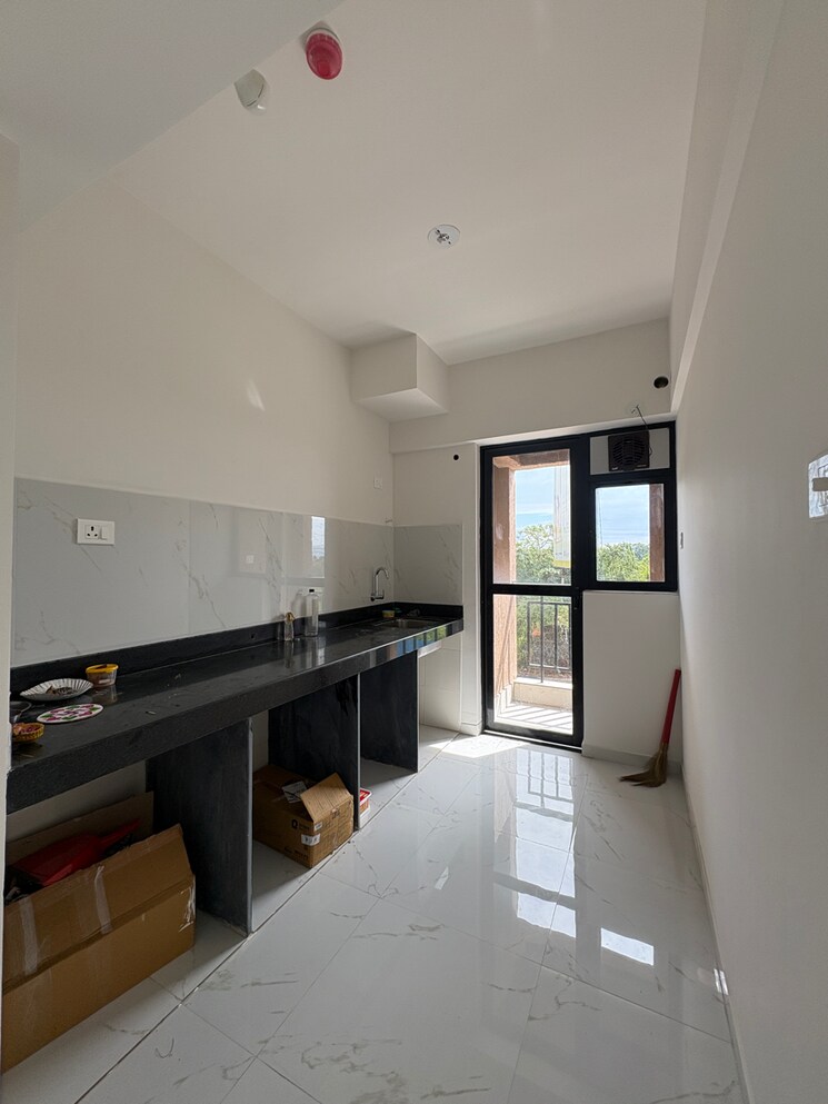 Kitchen, runwal-gardens-phase-3 3 Bedroom 731 Sq.Ft. Apartment In Kalyan Shilphata Road Thane 9563897