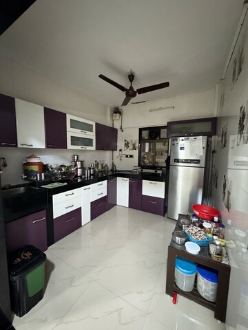 Kitchen in 3 BHK Apartment at Anand Sarita CHS, Sector 7 – for Sale
