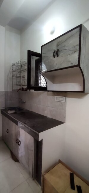 Kitchen in 1 RK Apartment at RWA Jasola Sector 8 SFS Flat, Jasola – for Rent