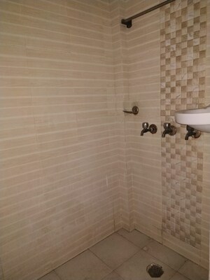 Bathroom in 1 BHK Apartment at Jasola Vihar – for Sale