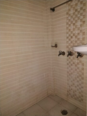 Bathroom in 1 BHK Apartment at Jasola Vihar – for Sale