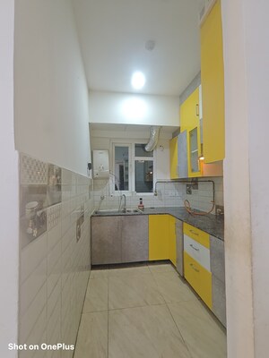 Kitchen in 2 BHK Apartment at Gaur City 2 - 14th Avenue, Sector 16c Greater Noida – for Rent