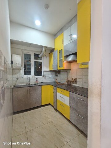 Kitchen in 2 BHK Apartment at Gaur City 2 - 14th Avenue, Sector 16c Greater Noida – for Rent