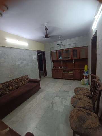Living Room in 2 BHK Apartment at Crystal Palace CHS, Malad West – for Rent