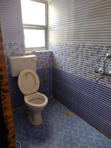 Master Bedroom in 2 BHK Builder Floor at Six Mile – for Sale