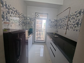 Kitchen in 1 BHK Apartment at Raunak Heights, Ghodbunder Road – for Rent