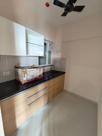 Kitchen in 2 BHK Apartment at Omkar Signet, Malad East – for Rent