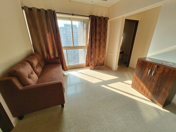 Living Room in 2 BHK Apartment at Omkar Signet, Malad East – for Rent