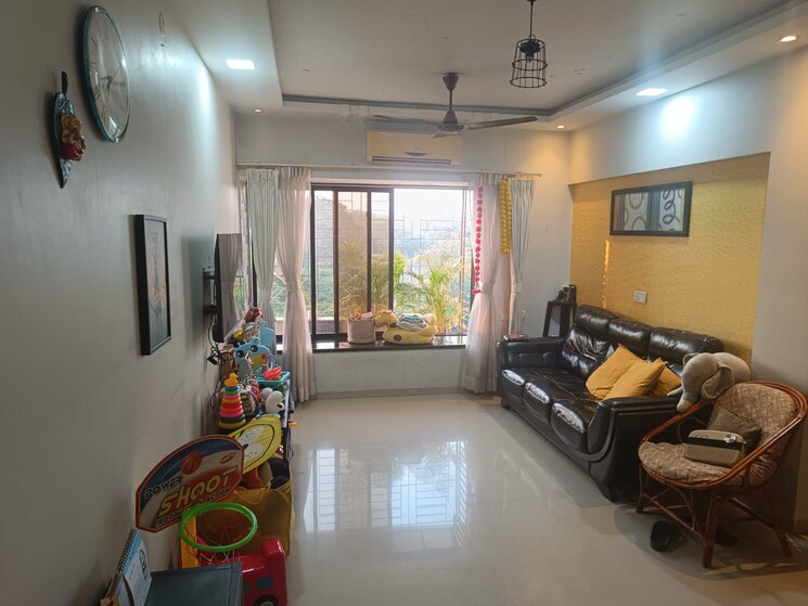 Living Room, neighbourhood-society 2 Bedroom 830 Sq.Ft. Apartment In Malad East Mumbai 9564379