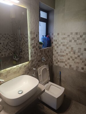 Bathroom in 2 BHK Apartment at Neighbourhood Society, Malad East – for Rent