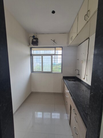 Kitchen in 2 BHK Apartment at Moraj Prive, Kopar Khairane – for Rent