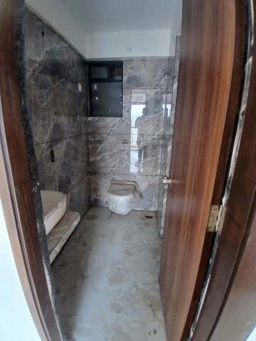 Bathroom in 2 BHK Apartment at Sai Plaza Kopar Khairane, Kopar Khairane Sector 20 – for Sale