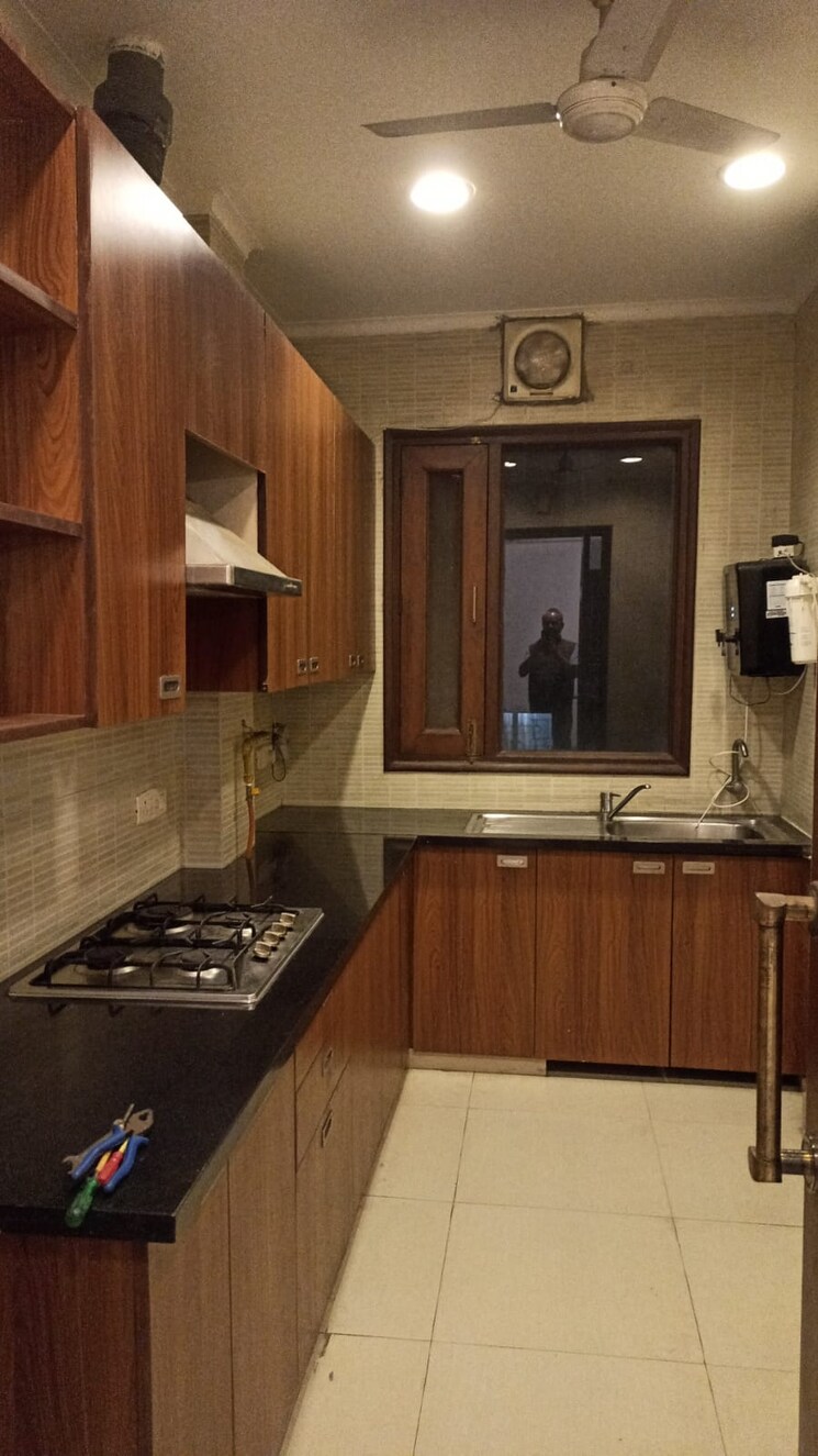 Kitchen, gulmohar park 3 Bedroom 200 Sq.Yd. Builder Floor In Gulmohar Park Delhi 9564515