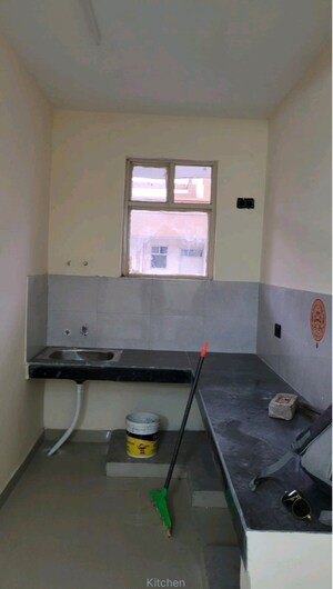 Kitchen in 2 BHK Apartment at Adore Happy Homes Pride, Sector 75 – for Rent