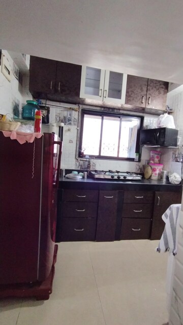 Kitchen in 1.5 BHK Apartment at Royal Oasis, Malad West – for Rent