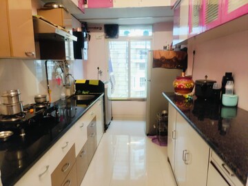 Kitchen in 2 BHK Apartment at Puranik City, Kasarvadavali – for Sale