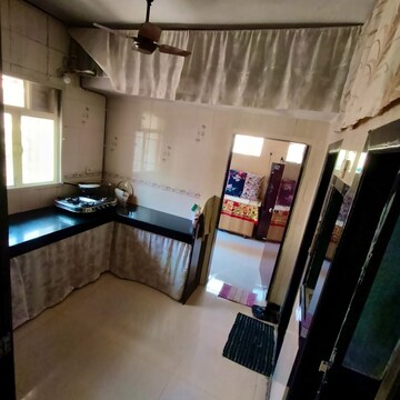 Living Room in 2 BHK Apartment at Om Sai Palace CHS, Beverly Park – for Sale