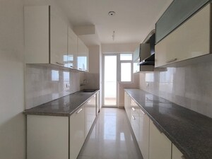 Kitchen in 3.5 BHK Apartment at Emaar Palm Gardens, Sector 83 – for Sale