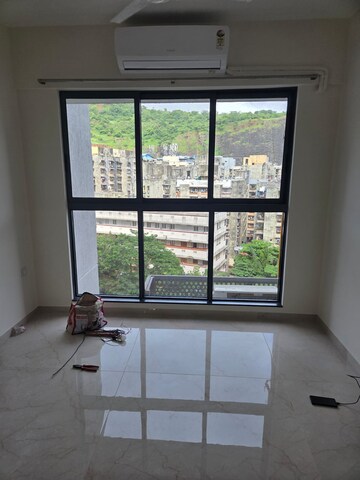 Living Room in 1 BHK Apartment at Godrej Urban Park, Chandivali – for Rent