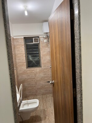 Bathroom in 2.5 BHK Apartment at Parinee Essence, Kandivali West – for Rent