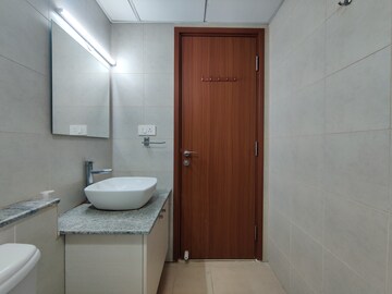 Bathroom in 2 BHK Apartment at Bhartiya Nikoo Homes Phase 2, Thanisandra Main Road – for Rent