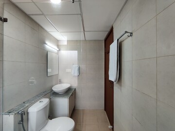 Bathroom in 2 BHK Apartment at Bhartiya Nikoo Homes Phase 2, Thanisandra Main Road – for Rent