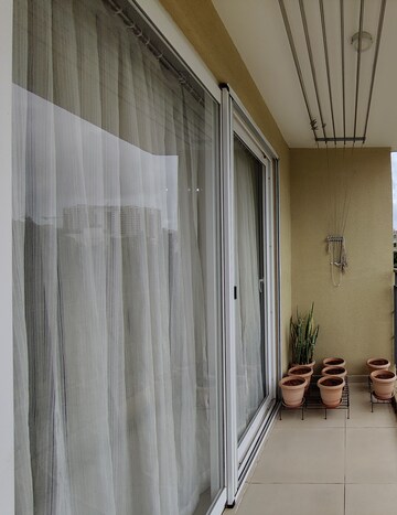 Building Lobby in 2 BHK Apartment at Bhartiya Nikoo Homes Phase 2, Thanisandra Main Road – for Rent