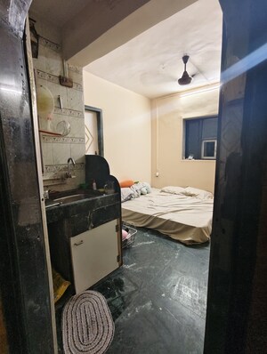 Kitchen in 1 BHK Apartment at Unity Apartment Malad, Malad West – for Rent