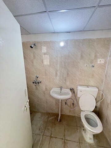 Bathroom in 2 BHK Apartment at Signature The Millennia 3, Sector 37d – for Rent