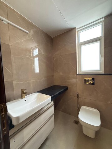 Bathroom in 3 BHK Apartment at Smart World Orchard, Sector 61 – for Rent