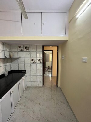 Kitchen in 2 BHK Apartment at Vashi Sector 9 – for Rent