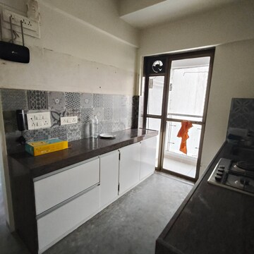 Kitchen in 2 BHK Apartment at Cosmopolis Tower, Andheri West – for Rent