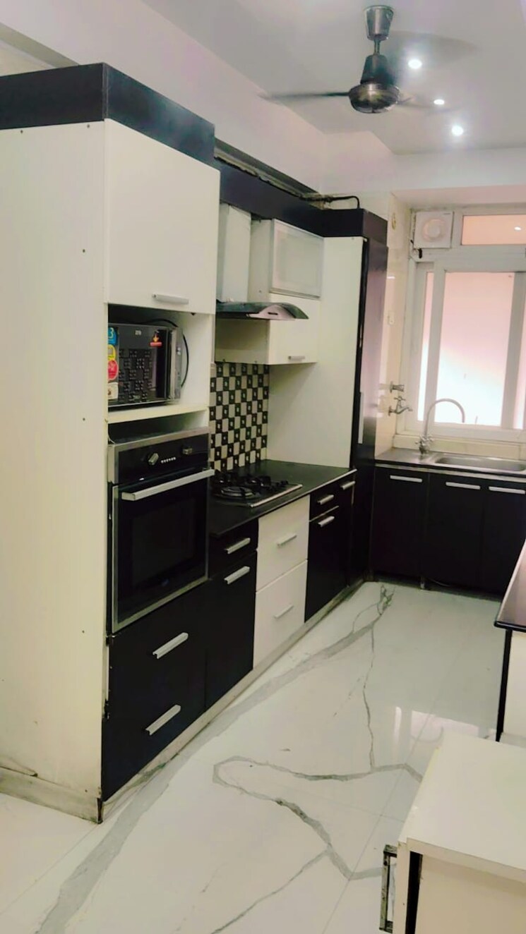 Kitchen, krishna-apra-residency 3.5 Bedroom 1847 Sq.Ft. Apartment In Sector 61 Noida 9565433