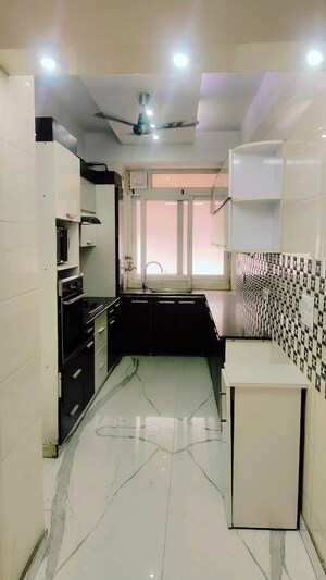 Kitchen in 3.5 BHK Apartment at Krishna Apra Residency, Sector 61 – for Sale