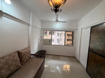 Living Room in 1 BHK Apartment at Shalom CHS, Jogeshwari West – for Rent