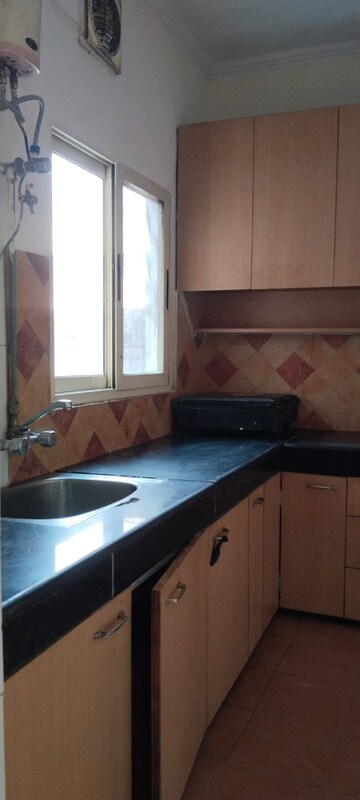 Kitchen in 1.5 BHK Builder Floor at Greater Kailash I – for Rent